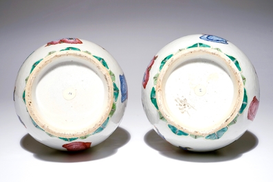 A pair of Chinese famille rose "Wu Shuang Pu" vases, 19th C.