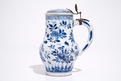 A twisted Chinese blue and white metal-mounted covered jug, Kangxi