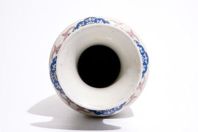 A Chinese famille rose rouleau vase in Yongzheng style, early 19th C.