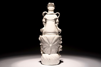 A tall Chinese Dehua blanc de Chine Guanyin seated on a lotus flower, 19/20th C.