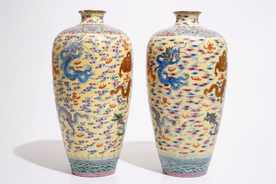 A pair of tall Chinese yellow ground meiping dragon vases, Qianlong mark, 20th C.