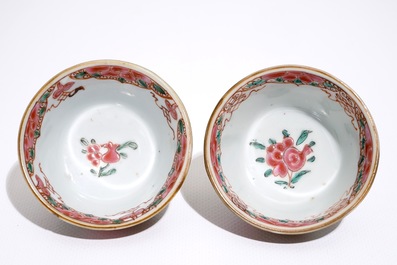 A pair of Chinese famille rose capucin ground cups and saucers, Qianlong