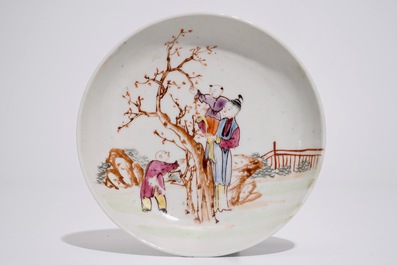 A Chinese famille rose mandarin cup and saucer, Qianlong