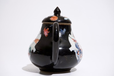 A Chinese black ground famille rose teapot and cover with geese, Yongzheng/Qianlong