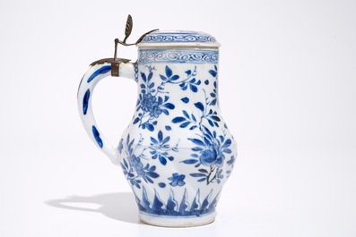 A twisted Chinese blue and white metal-mounted covered jug, Kangxi