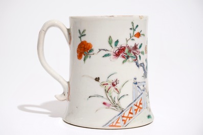 A Chinese famille rose mug with flowers and rockwork, Qianlong