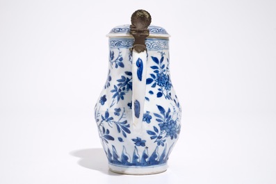 A twisted Chinese blue and white metal-mounted covered jug, Kangxi