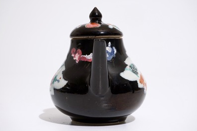 A Chinese black ground famille rose teapot and cover with geese, Yongzheng/Qianlong