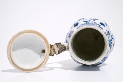 A twisted Chinese blue and white metal-mounted covered jug, Kangxi