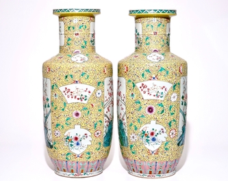 A pair of large Chinese yellow ground famille rose vases, 19/20th C.