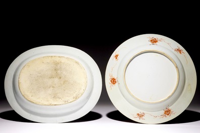 A Chinese famille rose dish with a flowerbasket and an oval blue and white floral dish, Qianlong