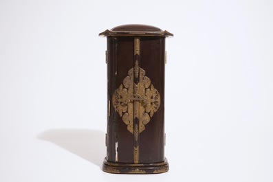 A Japanese lacquered and gilt wood "Zushi" shrine with a standing Buddha on a lotus throne, Edo, 17/18th C.