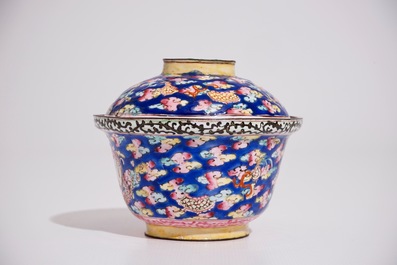 A Chinese Canton enamel blue ground dragon cup and saucer, 19th C.