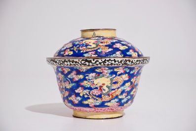 A Chinese Canton enamel blue ground dragon cup and saucer, 19th C.