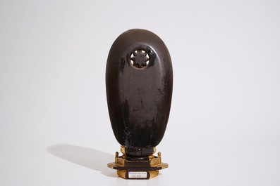 A Japanese lacquered and gilt wood "Zushi" shrine with a standing Buddha on a lotus throne, Edo, 17/18th C.