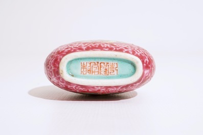 A fine Chinese famille rose ruby ground snuff bottle, 19th C.