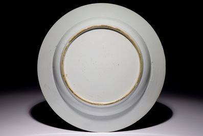 A large Chinese famille rose dish with a central flower medallion, Yongzheng/Qianlong