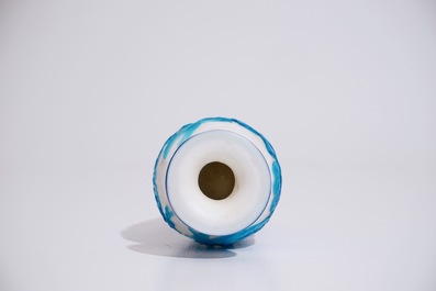 A Chinese blue overlay Beijing glass vase, 19/20th C.