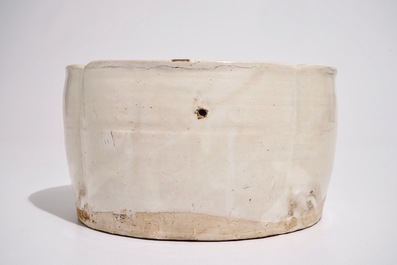 A Chinese Cizhou cream-glazed sgraffiato pillow, Song, 12th C.