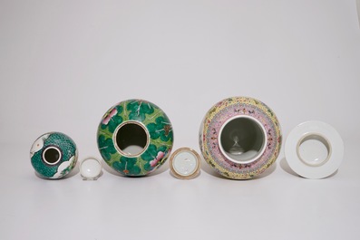 Two Chinese famille rose vases and covers and a small covered famille verte ginger jar, 19/20th C.