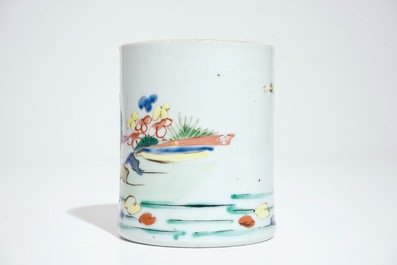A cylindrical Chinese famille rose brushpot with figures in a garden, Qianlong