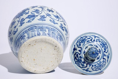 A Chinese blue and white peony scroll vase and cover, Ming, Wanli