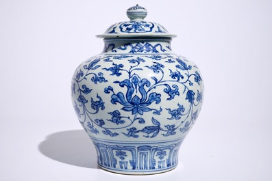A Chinese blue and white peony scroll vase and cover, Ming, Wanli