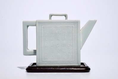A square Chinese celadon glazed teapot with relief design, Qianlong mark, 19/20th C.