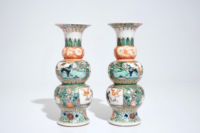 A pair of Chinese famille verte triple gourd vases, 19th C.