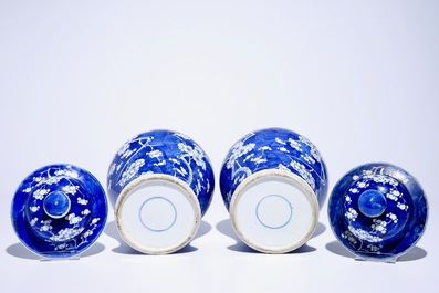 A pair of Chinese blue and white covered jars with "prunus on breaking ice" design, 19th C
