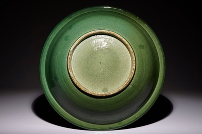 A large Chinese dark green celadon &ldquo;Twin fish&rdquo; dish, 20th C.