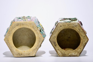 Two Chinese famille rose hexagonal relief-decorated vases, 19th C.