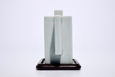 A square Chinese celadon glazed teapot with relief design, Qianlong mark, 19/20th C.