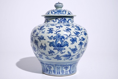 A Chinese blue and white peony scroll vase and cover, Ming, Wanli