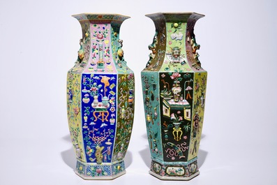 Two Chinese famille rose hexagonal relief-decorated vases, 19th C.