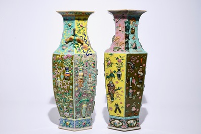 Two Chinese famille rose hexagonal relief-decorated vases, 19th C.