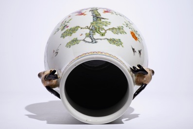 A Chinese famille rose hu vase with phoenixes and deer head handles, Qianlong mark, 19/20th C.