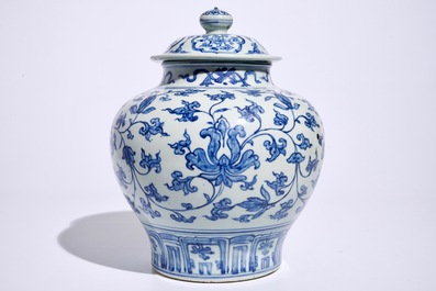 A Chinese blue and white peony scroll vase and cover, Ming, Wanli