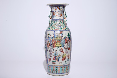 A tall Chinese famille rose vase with a garden scene, 19th C.