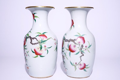 A pair of Chinese famille rose "nine peaches" vases, 19th C.