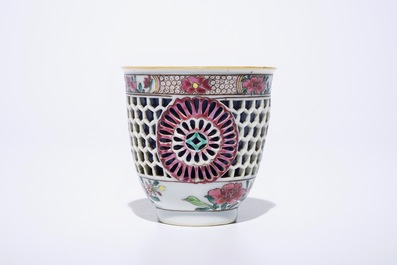 A Chinese double-walled famille rose cup and saucer, Yongzheng/Qianlong