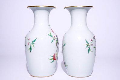 A pair of Chinese famille rose "nine peaches" vases, 19th C.