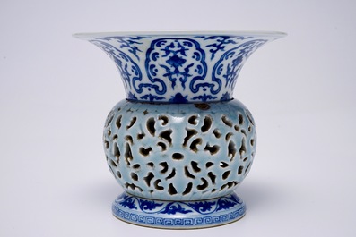 A rare blue, white and lavender-glazed reticulated revolving zhadou spittoon, Qianlong mark, 19/20th C.