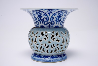 A rare blue, white and lavender-glazed reticulated revolving zhadou spittoon, Qianlong mark, 19/20th C.