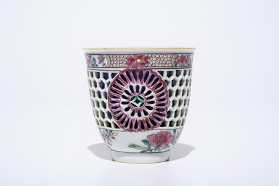 A Chinese double-walled famille rose cup and saucer, Yongzheng/Qianlong