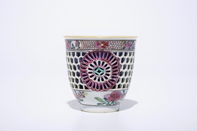 A Chinese double-walled famille rose cup and saucer, Yongzheng/Qianlong
