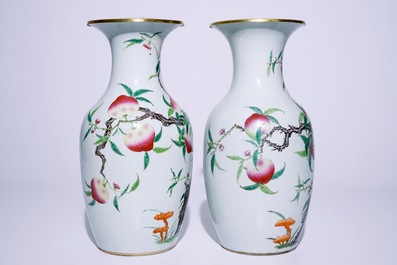 A pair of Chinese famille rose "nine peaches" vases, 19th C.