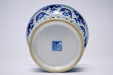 A rare blue, white and lavender-glazed reticulated revolving zhadou spittoon, Qianlong mark, 19/20th C.