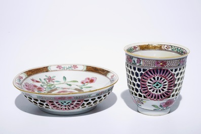 A Chinese double-walled famille rose cup and saucer, Yongzheng/Qianlong