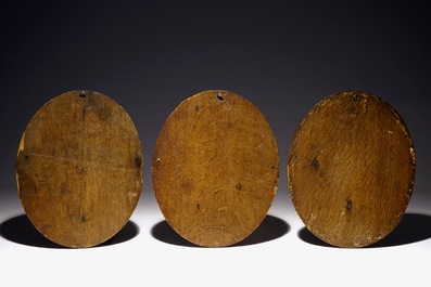 Three Flemish carved wooden medallions with allegorical depictions of "Glory", "Hell" and "Death", 17th C.
